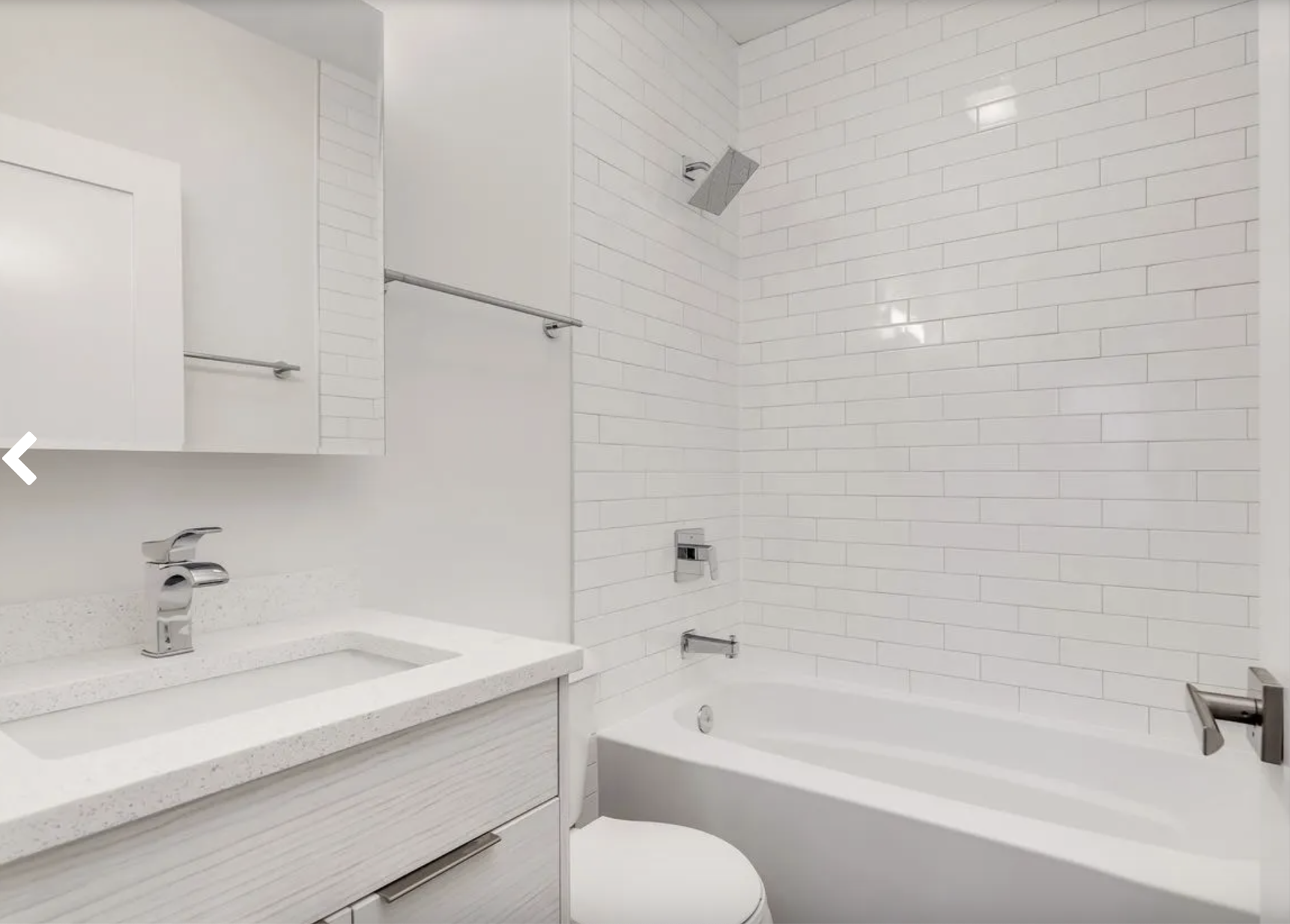 Refinished tub and shower surround corner detail